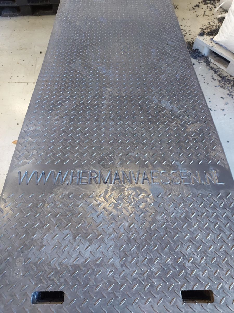 Engraving company name on a ground protection mat - photos 5